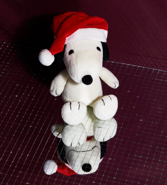Snoopy Sitting with Christmas Hat